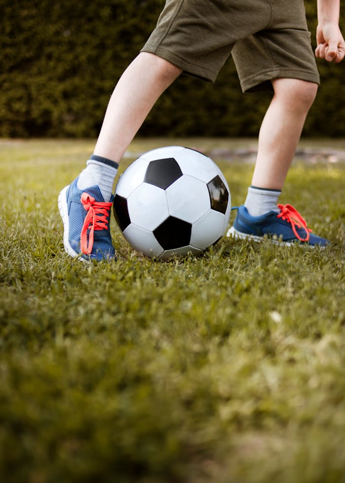 Boy Playing With Soccer Ball